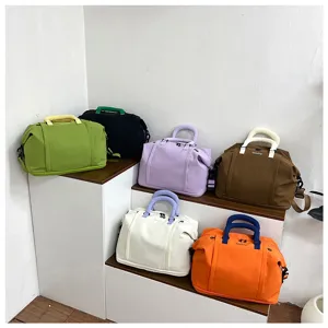 Large capacity canvas travel duffel bag multi-color portable weekend luggage bag for women.