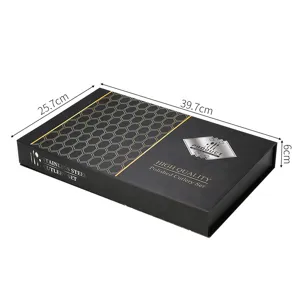 Coffret cadeau de couverts en acier inoxydable avec design élégant et finition noire.