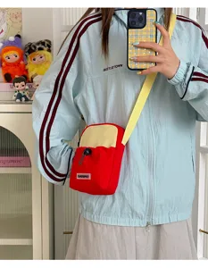 Bolso bandolera impermeable multifuncional con cierre de cordón para uso diario.