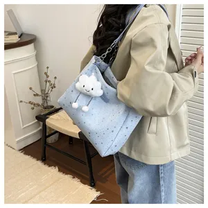 Casual blue star tote bag with cute cloud pendant, stylish large capacity shoulder bag for daily.