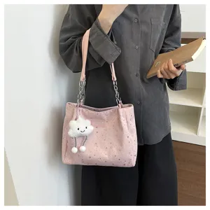 Stylish pink star print underarm shoulder bag with cute cloud plush pendant, perfect detail.