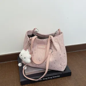 Pink star pattern shoulder tote bag with cute plush cloud charm for women casual daily commuting.