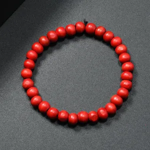 Sencilla pulsera de cuentas de madera roja, cuentas redondas suaves, hilo elastico comodo.