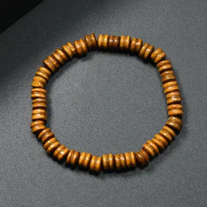 Close-up detail of retro wooden abacus bead bracelet, showing natural wood texture.