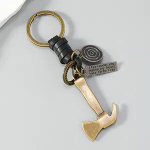 Retro metal axe keychain pendant detail view, showing exquisite vintage craftsmanship and leather.