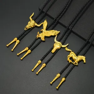 Detailed close-up of western cowboy bolo ties with gold metal animal pendants and black cords.