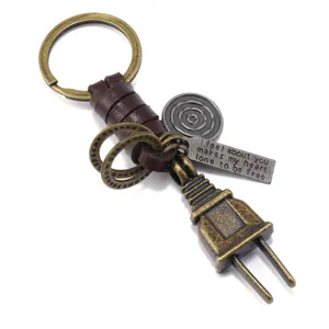 Vintage metal plug keychain with braided cowhide rope and engraved metal tag pendant for men.