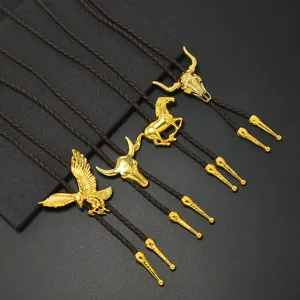 Vintage bolo tie necklace featuring gold metal animal pendants and braided leather style.