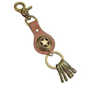 Vintage leather star keychain with lobster clasp and metal key rings for daily use.