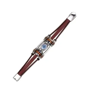 Pulsera de cuero multicapa estilo punk con ojo azul y hebilla de acero inoxidable.