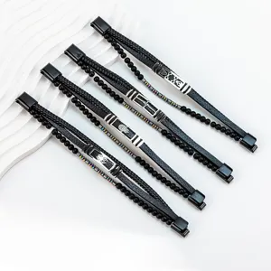 Pulsera cuero trenzado negro multicapa para hombre con tubos de acero y cierre magnético.