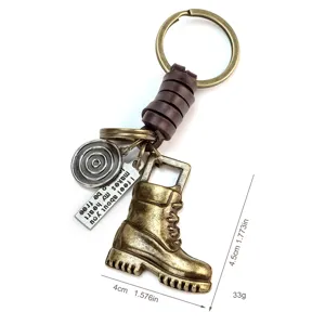 Vintage leather boot keychain with metal martins boot pendant, creative handmade bag accessory.