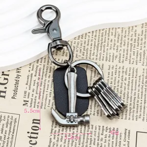 Retro alloy hammer keychain with bottle opener, creative hip-hop style metal pendant gift.