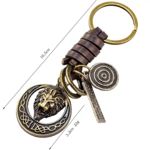 Porte-clés tête de lion rétro en cuir et métal, accessoire élégant et robuste pour clés.