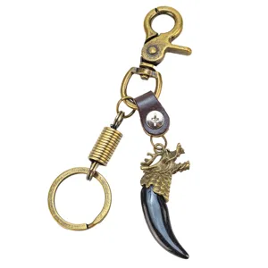 Vintage Chinese dragon keychain with genuine leather strap and alloy lobster clasp accessory.