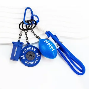 Blue sports keychain featuring football, fitness dumbbell plate, and water bottle charms.