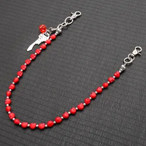Detailed close-up shot of red skull beaded pants chain punk hip hop wallet chain accessory