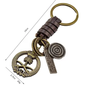 Vintage leather braided keyring with palm tree badge and metal charms for men and women.