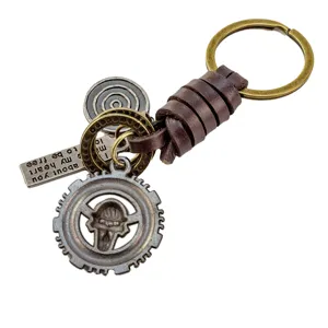 Vintage steampunk leather keychain with metal gear pendant and engraved tag details.