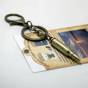 Vintage Patronen Schlüsselanhänger Legierung Bronze Anhänger Tasche Charm Schlüsselhalter