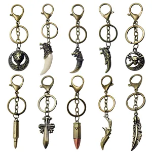 Vintage Legierung Schlüsselanhänger Punk Wolf Löwe Totenkopf Kugel Kreuz Feder Anhänger Schlüsselring Retro Metall Tasche Schmuck Geschenk