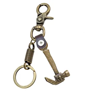 Vintage bronze metal hammer keychain with bottle opener, creative hip-hop punk key ring.