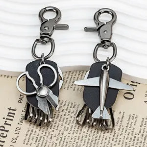 Set portachiavi aereo e forbici in metallo punk vintage, accessorio stile rock da strada.