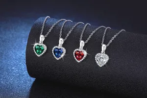Detailed view of exquisite S925 silver heart necklaces featuring four vibrant colored stones.