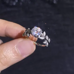 Exquisite 1-carat moissanite ring with elegant leaf design, perfect for women's luxury style.