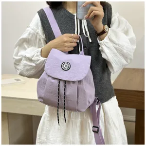 Mini sac à dos décontracté de style coréen en violet clair, petit sac étanche léger et quotidien.