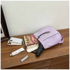 Petit sac à dos décontracté minimaliste coréen pour femmes, léger et étanche uni.