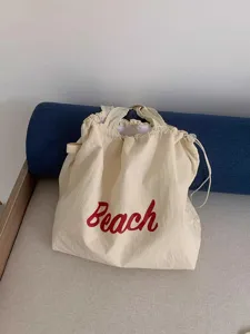 Koreaanse stijl grote capaciteit letter print canvas schoudertas casual shopper detail.