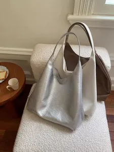 Detail view of the soft slouchy shoulder bag, large capacity commute tote bag in multi-colors.