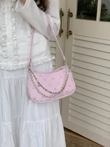 Pink quilted bow shoulder bag with pearl metal chain, sweet style underarm baguette bag for women.