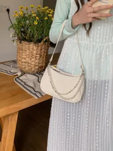 Quilted underarm bag with pearl metal chain, elegant white shoulder bag for daily casual chic.
