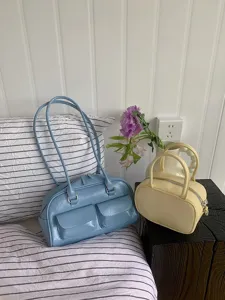 Stylish PU leather shoulder bag and small handbag set, casual daily fashion design detail view.