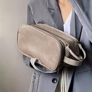 Portable large capacity travel cosmetic bag for toiletries and daily makeup storage.