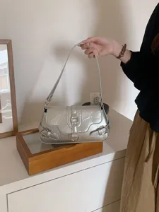 Silver metallic shoulder bag detail, crinkled PU leather with stylish metal buckles and strap.