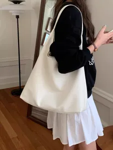 Minimalist white shoulder tote bag for women, large capacity PU leather commuter handbag.