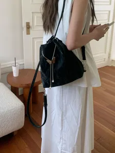 Velvet bucket bag for women stylish black backpack with metal butterfly and pearl tassel charm