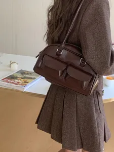 Women patent leather shoulder bag retro handbag casual trendy tote purse with double front pockets.