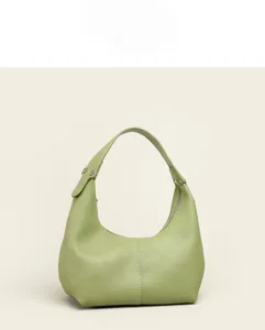 Green soft leather hobo bag detail shot, delicate texture and sleek minimalist stitching design.