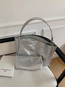 Stylish silver tote bag with matching pouch, premium crinkle leather shoulder commuting bag.