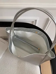 Silver metallic tote bag, spacious minimalist shoulder bag with inner pouch, stylish everyday commute.