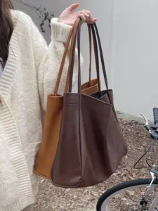 Vintage large capacity tote bag for women, soft leather casual shoulder shopping bag style.