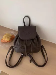 Vintage brown PU leather mini backpack for women, cute daily casual school travel daypack.