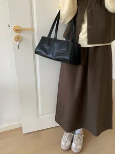Chic black faux leather baguette shoulder bag for women, retro autumn winter casual commute daily style.