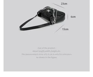 Black pleated baguette shoulder bag with silver chain and butterfly detail, 23x15x6cm chic purse.
