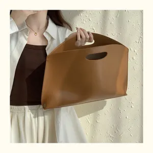 Minimalist brown 13-inch laptop sleeve bag for women, elegant thin office commuting briefcase.
