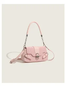 Pink quilted detail of the baguette underarm bag with chic metal lock and chain handle.